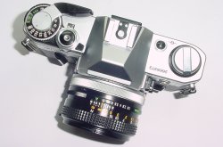Canon AE-1 35mm Film Manual SLR Camera + Canon 50/1.8 FD Lens