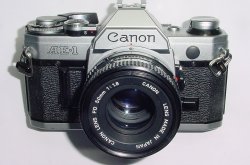 Canon AE-1 35mm Film Manual SLR Camera + Canon 50/1.8 FD Lens