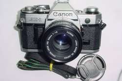Canon AE-1 35mm Film Manual SLR Camera + Canon 50/1.8 FD Lens