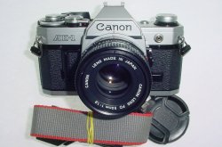 Canon AE-1 35mm Film Manual SLR Camera + Canon 50/1.8 FD Lens