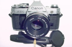 Canon AE-1 35mm Film Manual SLR Camera + Canon 50/1.8 FD Lens