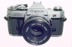 Canon AE-1 35mm Film Manual SLR Camera + Canon 50/1.8 FD Lens