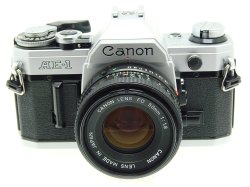 Canon AE-1 35mm Film Manual SLR Camera + Canon 50/1.8 FD Lens