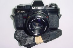 Minolta X-300 35mm Film SLR Manual Camera with Minolta 50mm F/1.7 Lens in Black