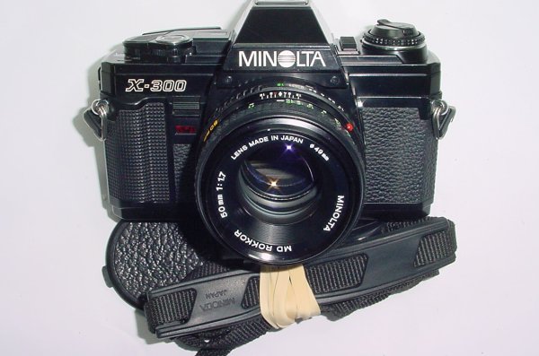 Minolta X-300 35mm Film SLR Manual Camera with Minolta 50mm F/1.7 Lens in Black
