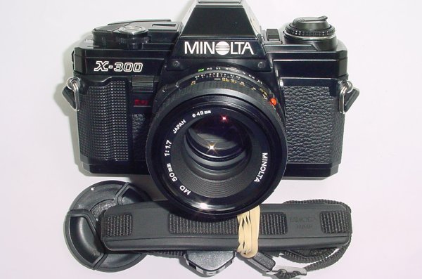 Minolta X-300 35mm Film SLR Manual Camera with Minolta 50mm F/1.7 Lens in Black