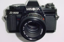 Minolta X-300 35mm Film SLR Manual Camera with Minolta 50mm F/1.7 Lens in Black