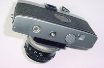 minolta SRT100b 35mm Film Manual Camera with Minolta ROKKOR - PF 50mm F/2 Lens