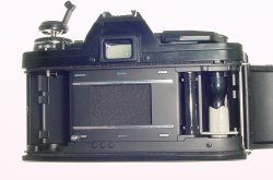 Minolta X-300 35mm Film SLR Manual Camera with Centon 50mm F/1.8 Lens in Black