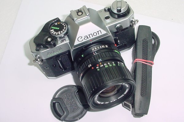 Canon AE-1 Program 35mm Film SLR Camera with Canon 35-70mm f/3.5-4.5 FD Zoom Lens