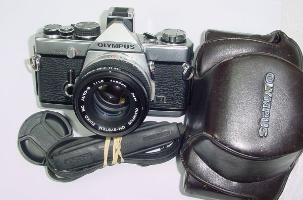 Olympus OM-2 MD 35mm Film SLR Manual Camera with Olympus 50mm F/1.8 Zuiko Lens