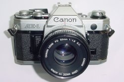 Canon AE-1 35mm SLR Film Manual Camera with Canon 50mm F/1.8 FD S.C. Lens