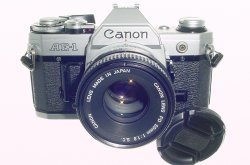Canon AE-1 35mm SLR Film Manual Camera with Canon 50mm F/1.8 FD S.C. Lens