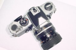 Nikon FM 35mm Film SLR Manual Camera + Nikon 35-70mm F/3.5-4.8 NIKKOR Lens