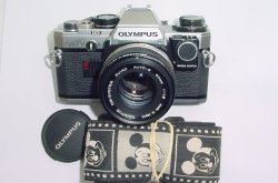 Olympus OM10 35mm Film SLR Manual Camera with Olympus 50/1.8 Zuiko Lens + MA