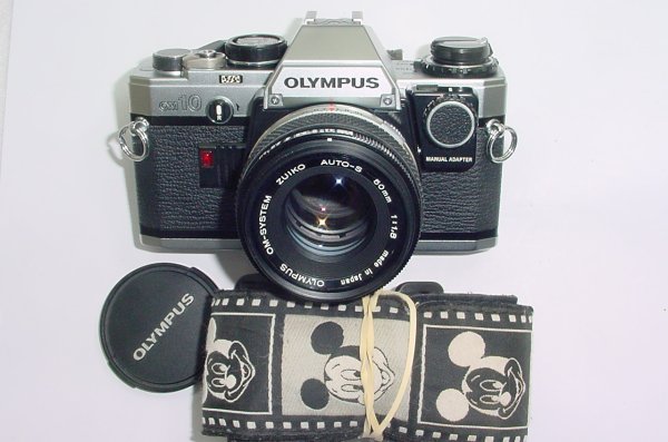 Olympus OM10 35mm Film SLR Manual Camera with Olympus 50/1.8 Zuiko Lens + MA