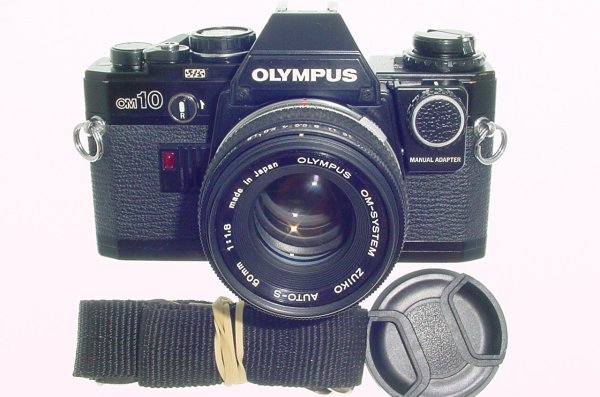 Olympus OM10 35mm Film SLR Manual Camera with Olympus 50/1.8 Zuiko Lens + MA