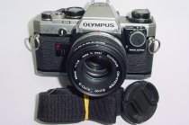 Olympus OM10 35mm Film SLR Manual Camera with Olympus 50/1.8 Zuiko Lens