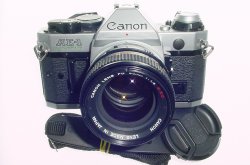 Canon AE-1 Program 35mm SLR Film Manual Camera with Canon 50mm F/1.4 FD Lens