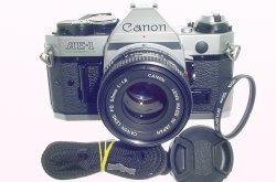 Canon AE-1 Program 35mm SLR Film Manual Camera with Canon 50mm F/1.8 FD Lens