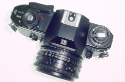 Nikon EM 35mm Film SLR Manual Camera with Nikon 50mm F1.8 Series E Pancake Lens
