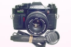 Olympus OM40 Program 35mm Film Camera with Olympus 50mm F/1.8 Zuiko Lens