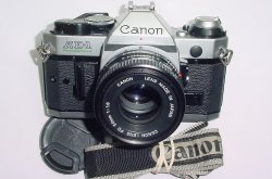 Canon AE-1 Program 35mm SLR Film Manual Camera with Canon 50mm F/1.8 FD Lens