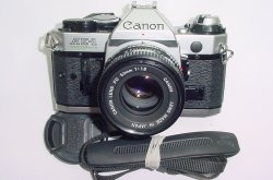 Canon AE-1 Program 35mm SLR Film Manual Camera with Canon 50mm F/1.8 FD Lens
