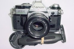 Canon AE-1 Program 35mm SLR Film Manual Camera with Canon 50mm F/1.8 FD Lens