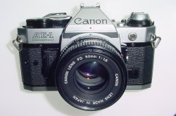 Canon AE-1 Program 35mm SLR Film Manual Camera with Canon 50mm F/1.8 FD Lens Canon AE-1 Program 35mm SLR Film Manual Camera with Canon 50mm F/1.8 FD Lens