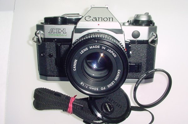 Canon AE-1 Program 35mm SLR Film Manual Camera with Canon 50mm F/1.8 FD Lens