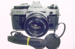 Canon AE-1 Program 35mm SLR Film Manual Camera with Canon 50mm F/1.8 FD Lens