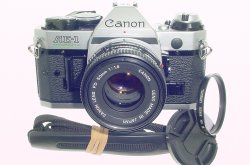 Canon AE-1 Program 35mm SLR Film Manual Camera with Canon 50mm F/1.8 FD Lens