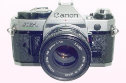 Canon AE-1 Program 35mm SLR Film Manual Camera with Canon 50mm F/1.8 FD Lens