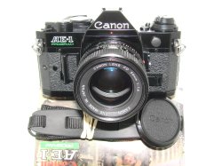 Canon AE-1 Program 35mm SLR Film Manual Camera + Canon 50mm F/1.4 FD Lens