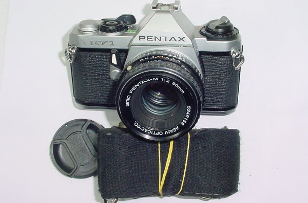 Pentax MV 1 35mm Film SLR Camera with Pentax-M 50mm F/2 SMC Lens in Silver