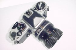 Nikon FE 35mm Film SLR Manual Camera + 35-70mm F/3.3-4.5 Zoom-Nikkor Lens