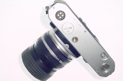 Nikon FE 35mm Film SLR Manual Camera + 35-70mm F/3.3-4.5 Zoom-Nikkor Lens