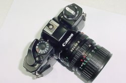 Canon T60 35mm Film SLR Manual Camera + Canon 35-70mm F/3.5-4.5 FD Zoom Lens
