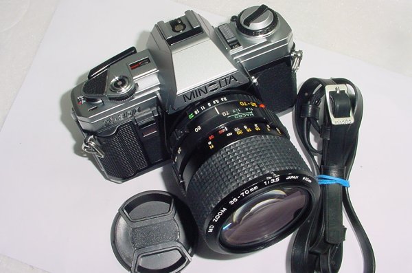 Minolta X-300 35mm Film SLR Manual Camera with Minolta 50mm F/1.7 MD Lens - Silver