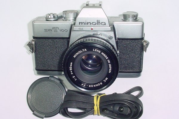 minolta SRT100 35mm Film Manual Camera with Minolta ROKKOR - PF 50mm F/2 MC Lens